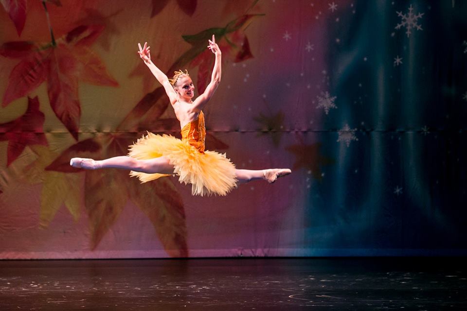 leaping ballerina in orange tutu
